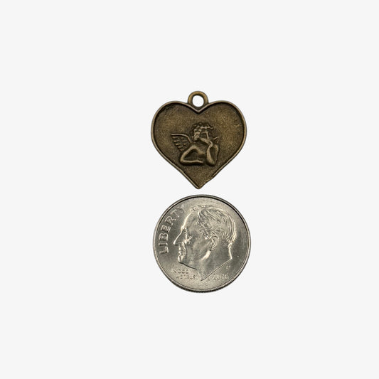 Angel heart charm on a white background