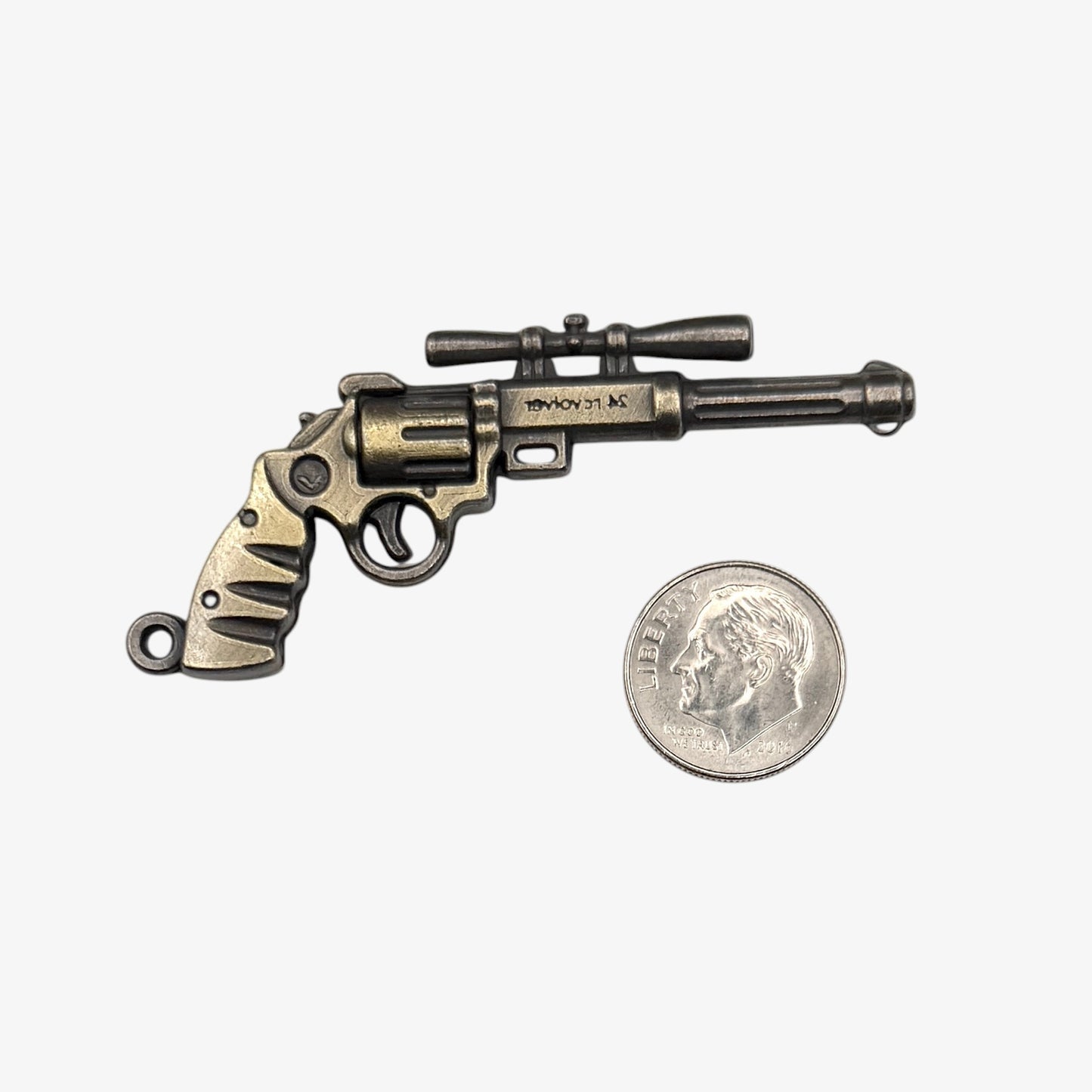 Small bronze revolver charm