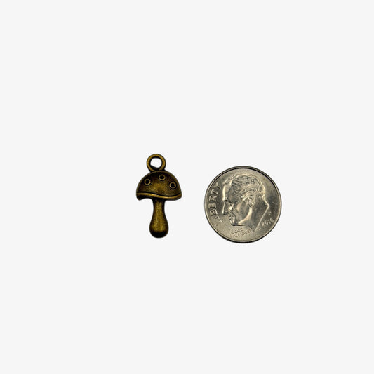 Bronze mushroom charm