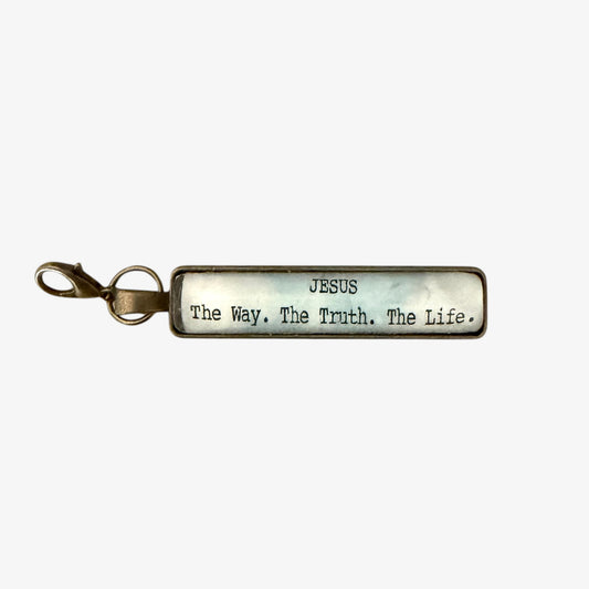 Keychain with 'Jesus The Way. The Truth. The Life.' text on a white background