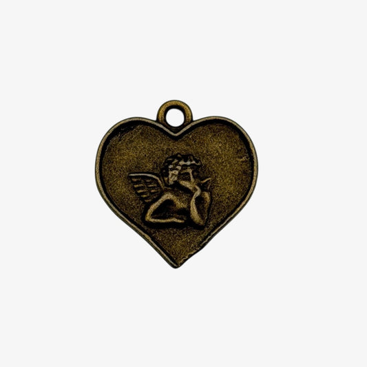Heart-shaped pendant with an angel design on a white background