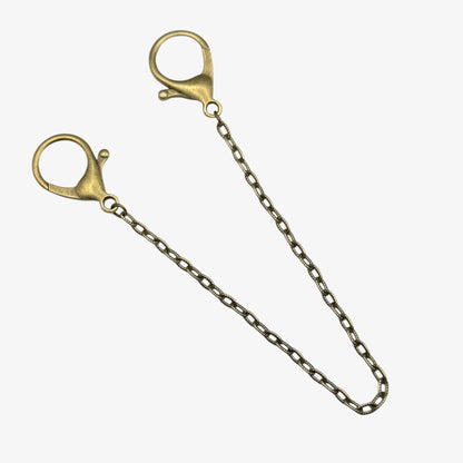 Gold chain with clasp on a white background
