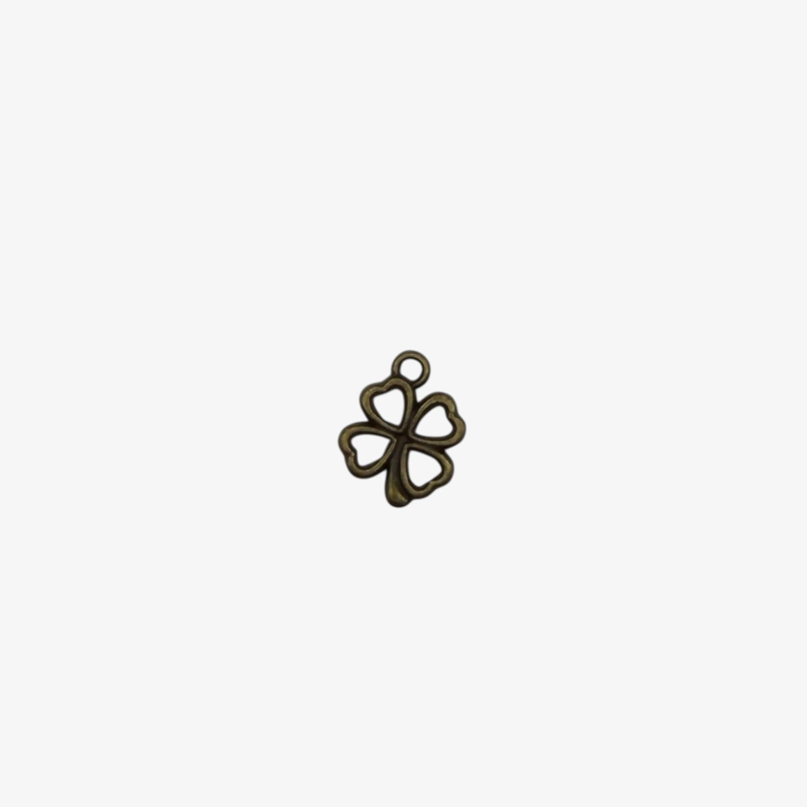 Bronze-colored four-leaf clover pendant on a white background