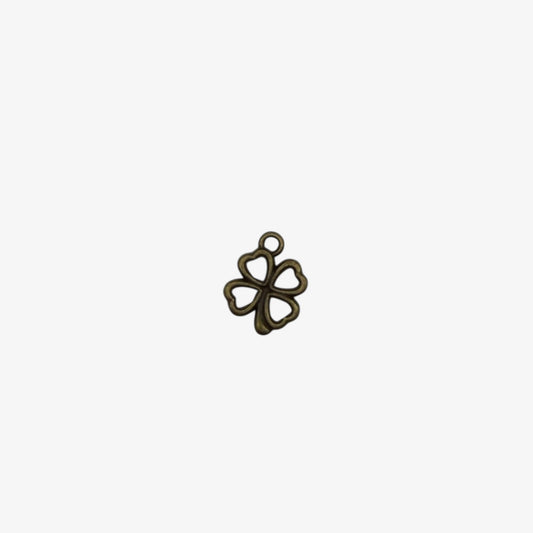 Bronze-colored four-leaf clover pendant on a white background
