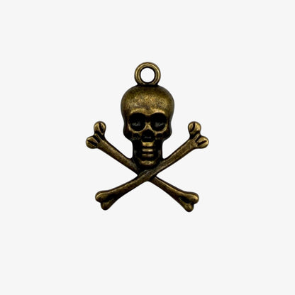 Bronze skull and crossbones pendant on a white background