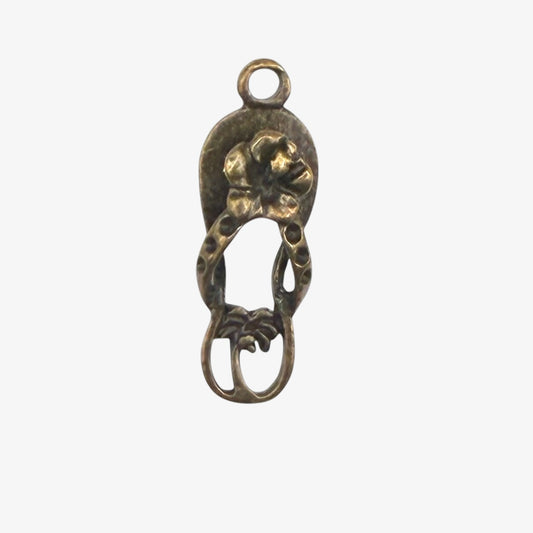 Bronze flip flop charm with flower and palm tree