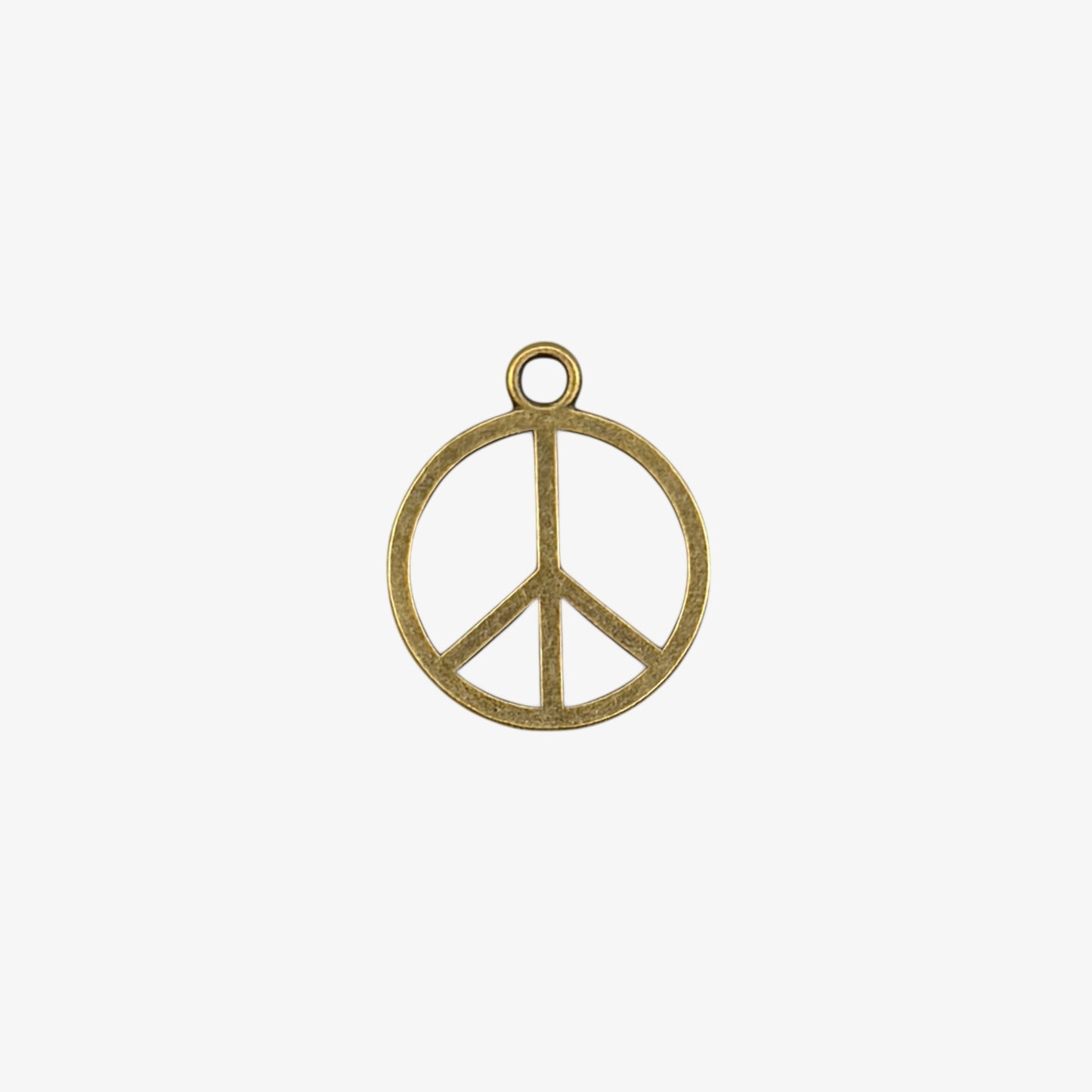 Bronze peace symbol charm on a white background