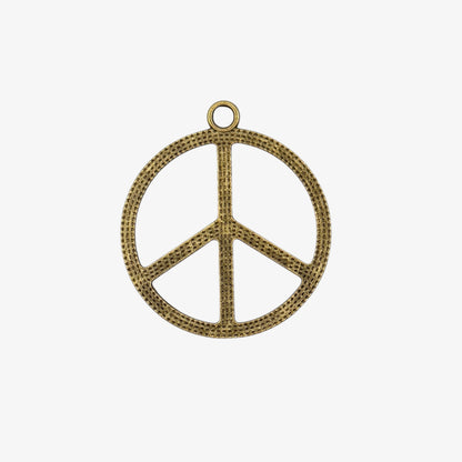 Bronze peace symbol pendant on a white background