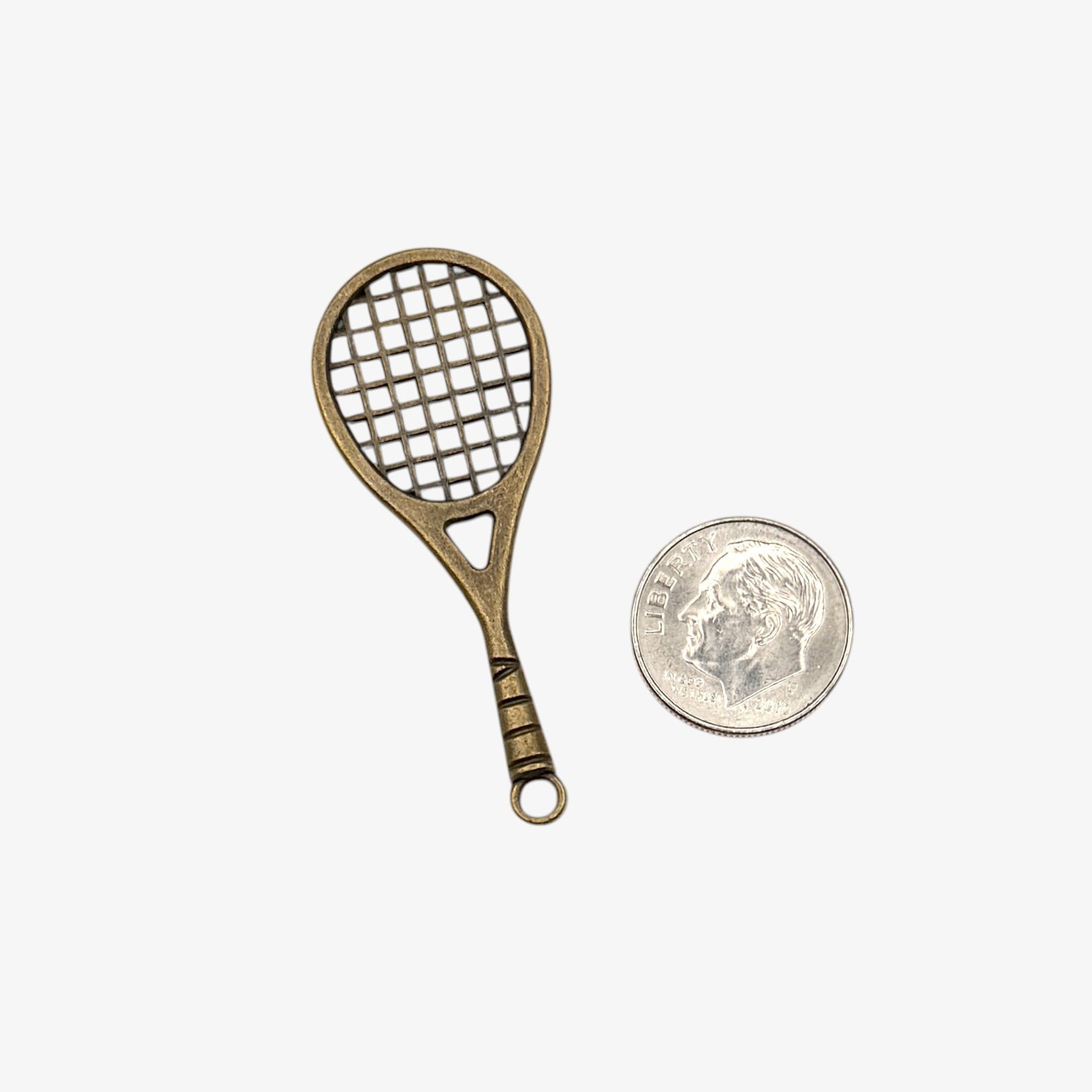 bronze tennis racket charm on a white background