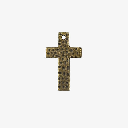 Bronze cross pendant on a white background