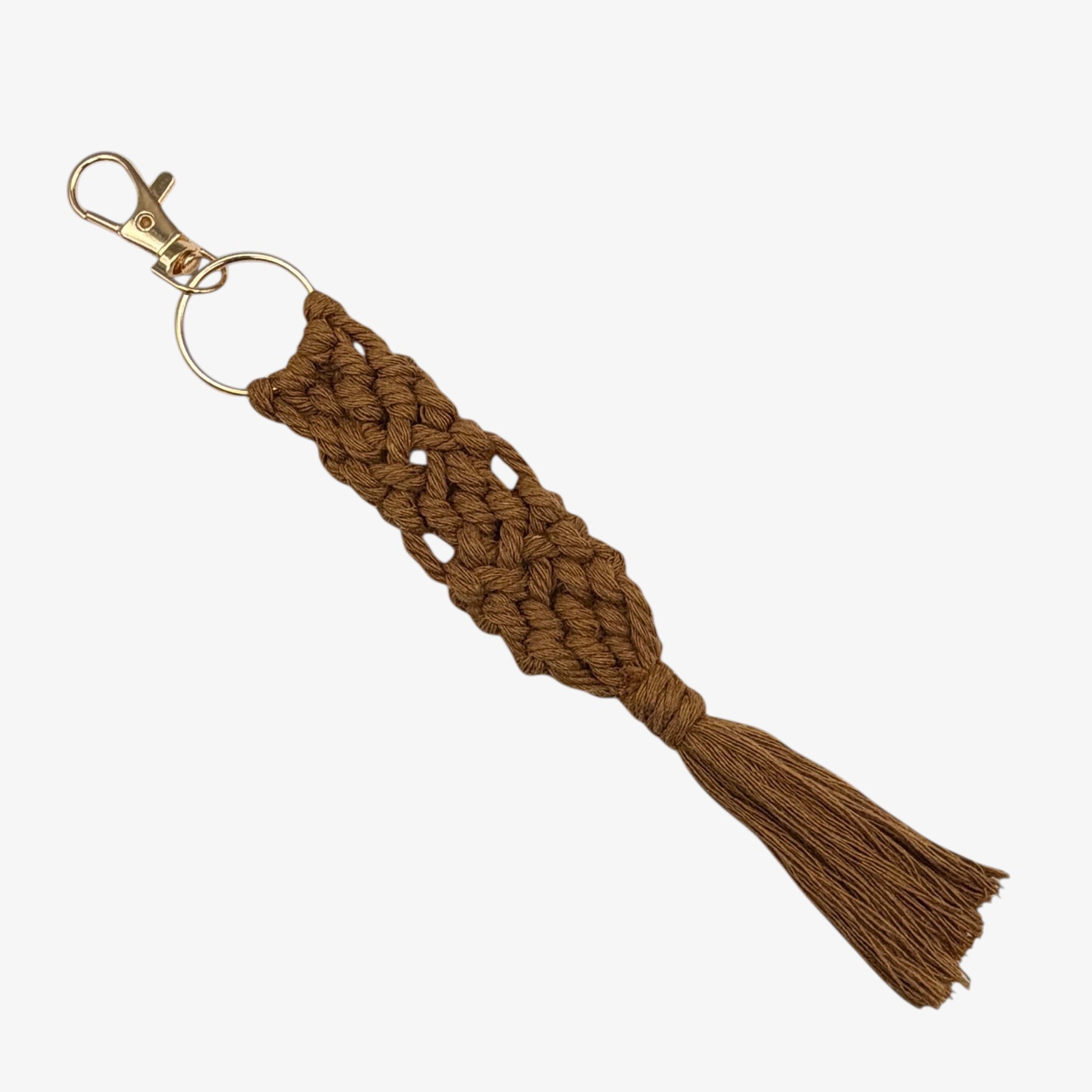 Brown braided keychain with a tassel on a white background