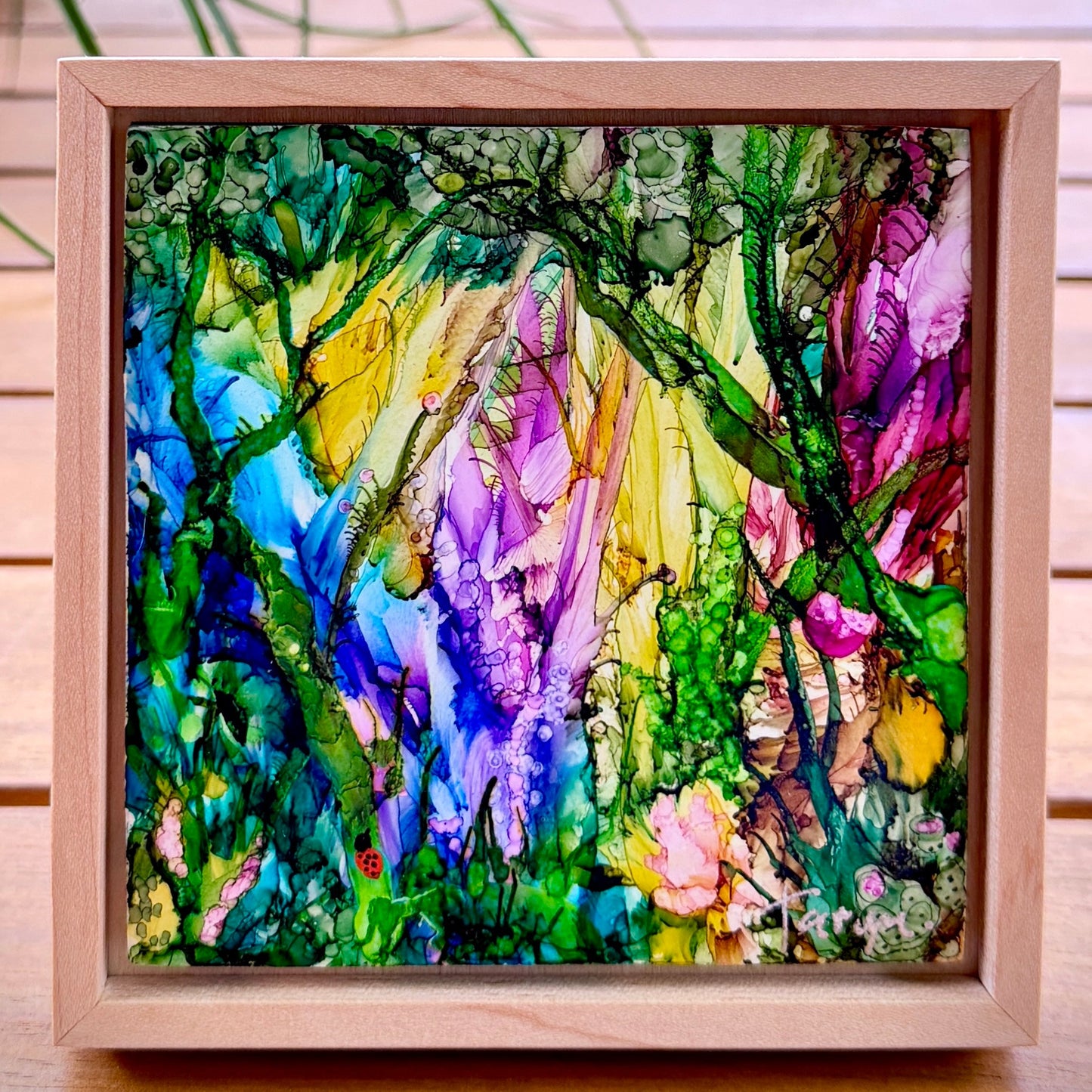 Colorful art in floater frame