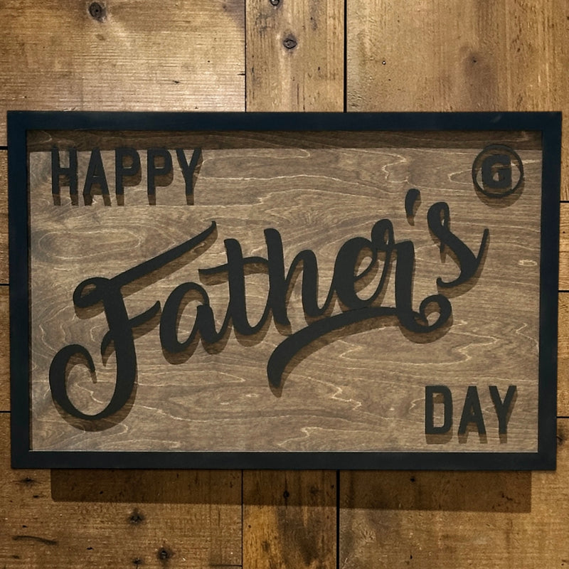 Wooden sign with 'Happy Father's Day' text on a wooden background