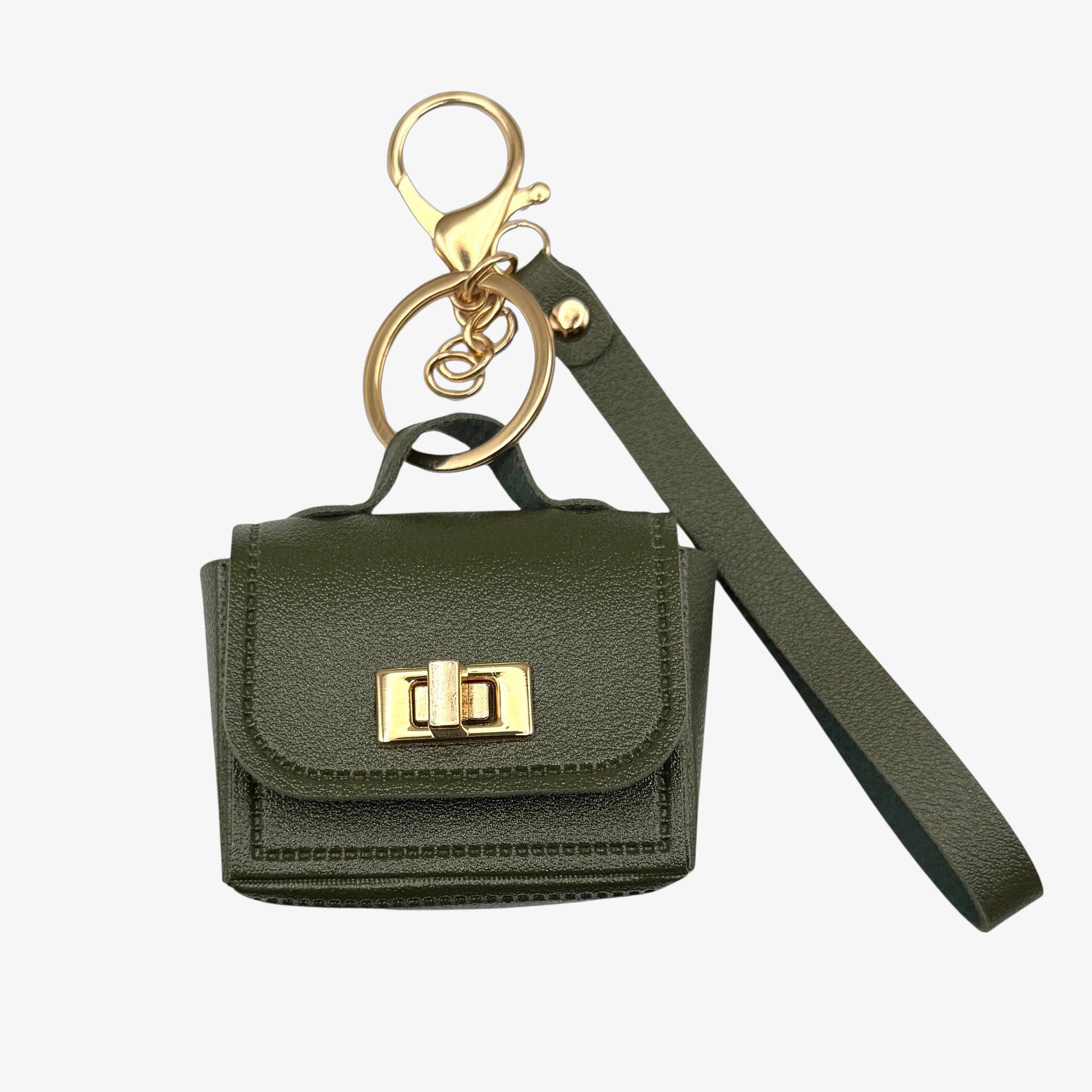 Green mini bag with gold accents and a matching keychain on a white background