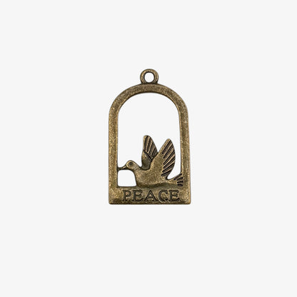 Bronze pendant with a dove and 'PEACE' text on a white background