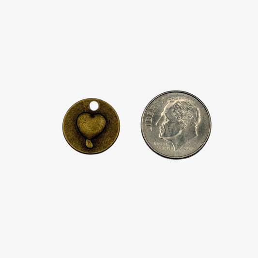 Small bronze round  charm with a heart on one side and love on the other
