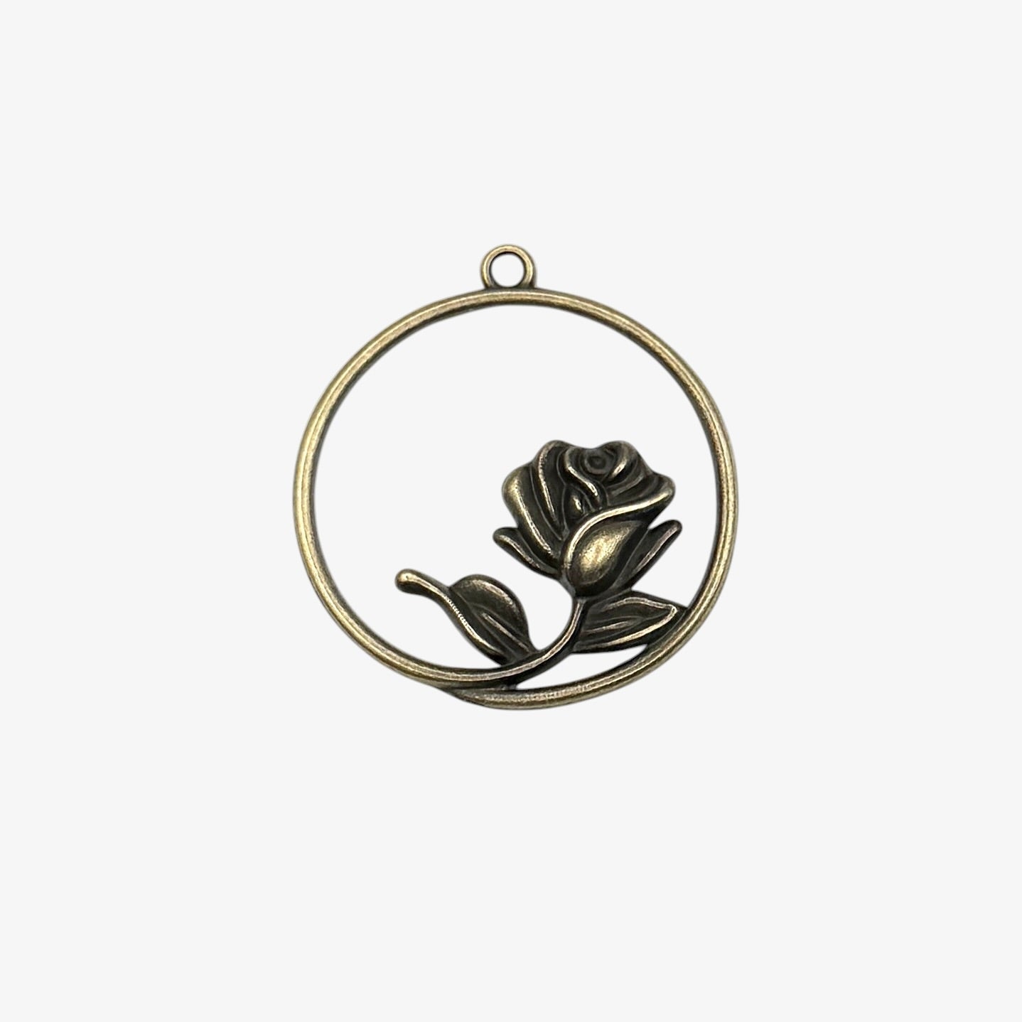 Bronze ring with a rose pendant