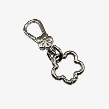 Silver keychain with a heart-shaped clasp on a white background