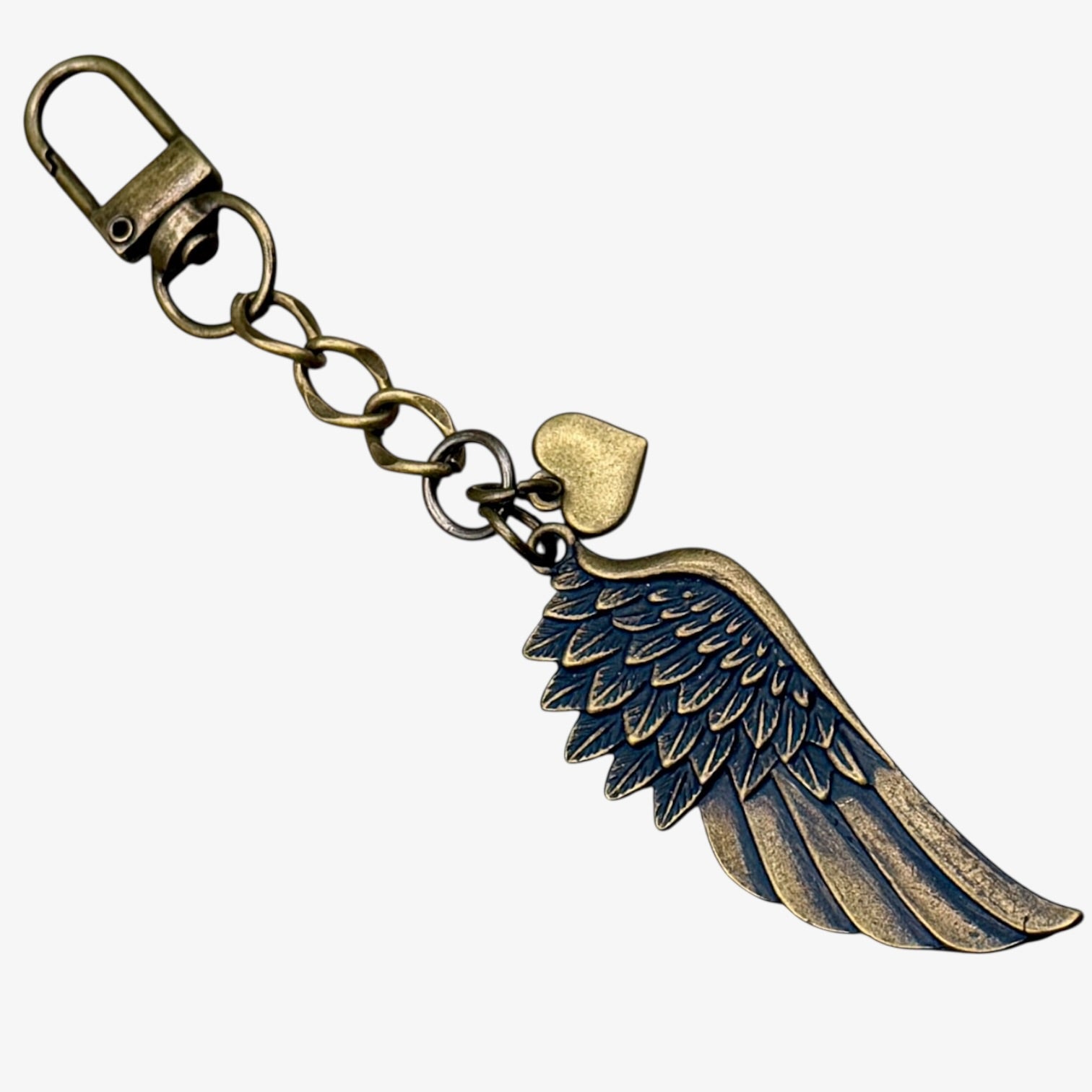 Bronze angel wing keychain on a white background