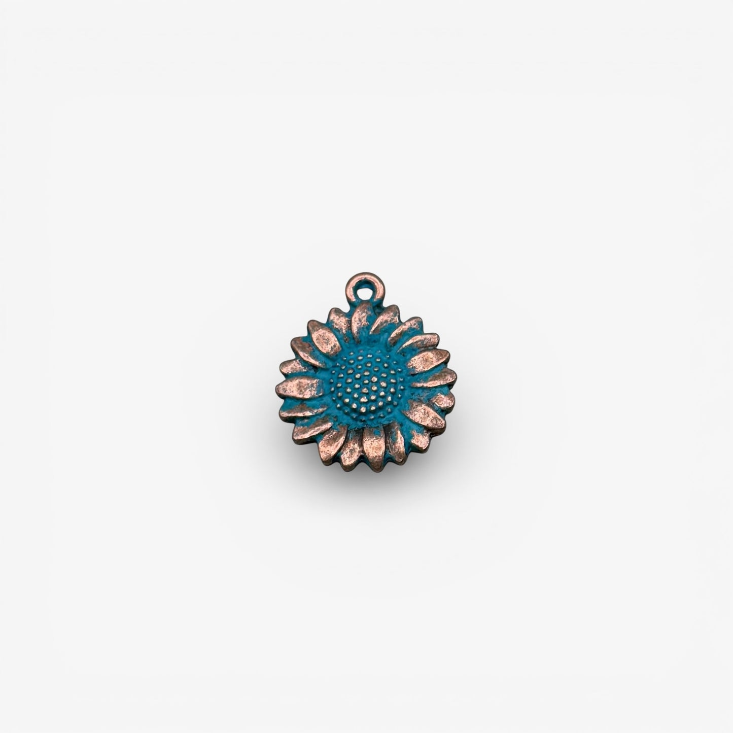 antique copper sunflower charm with turquoise