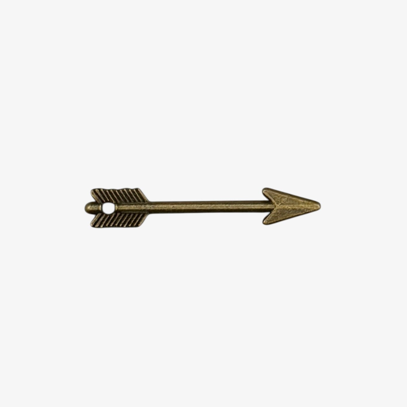 Bronze-colored arrow-shaped object on a white background