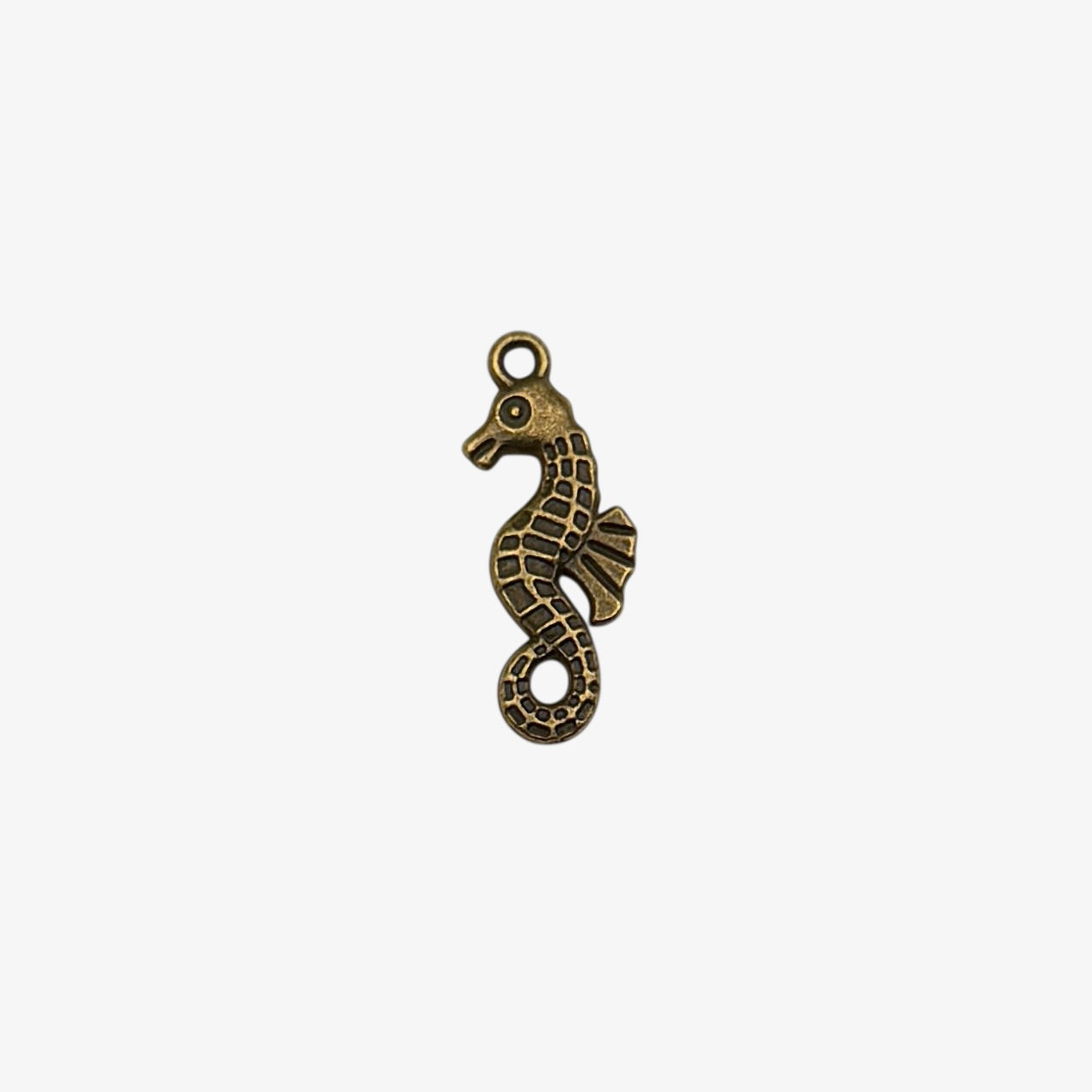 Gold hoop earring with letter 'A' charm on a white background