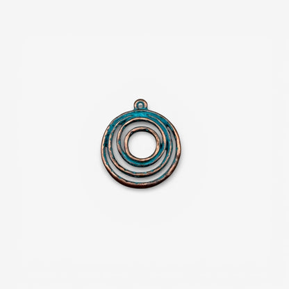 Decorative circular pendant with blue and bronze colors on a white background
