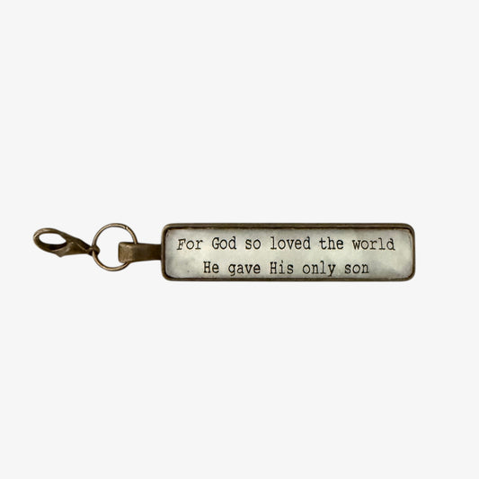 Keychain with engraved text on a white background