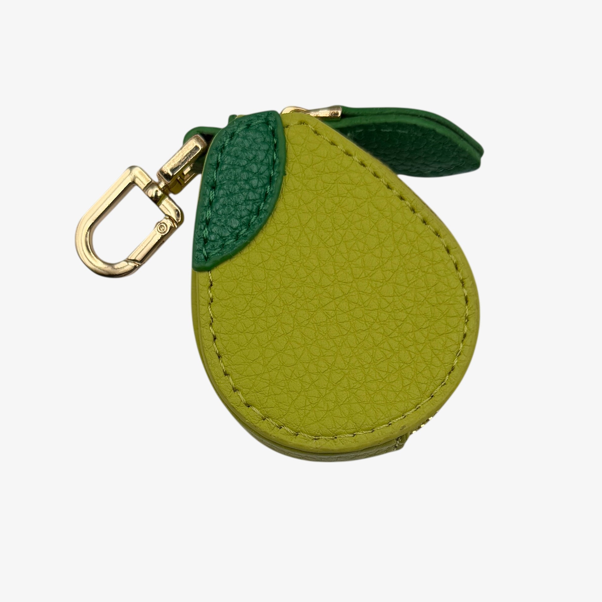 Green fruit-shaped keychain with gold clasp on a white background