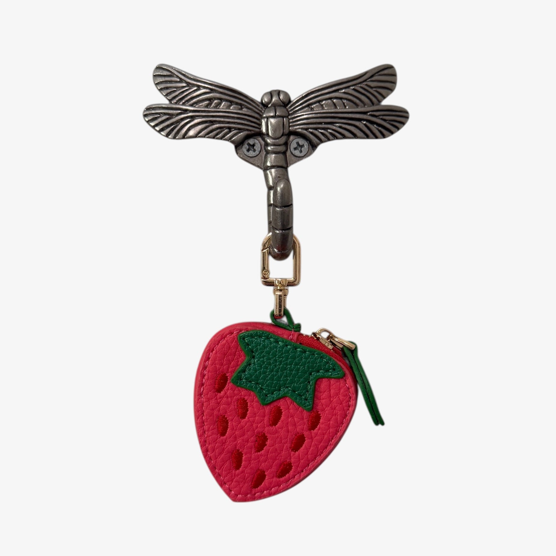 Strawberry-shaped keychain with on a white background