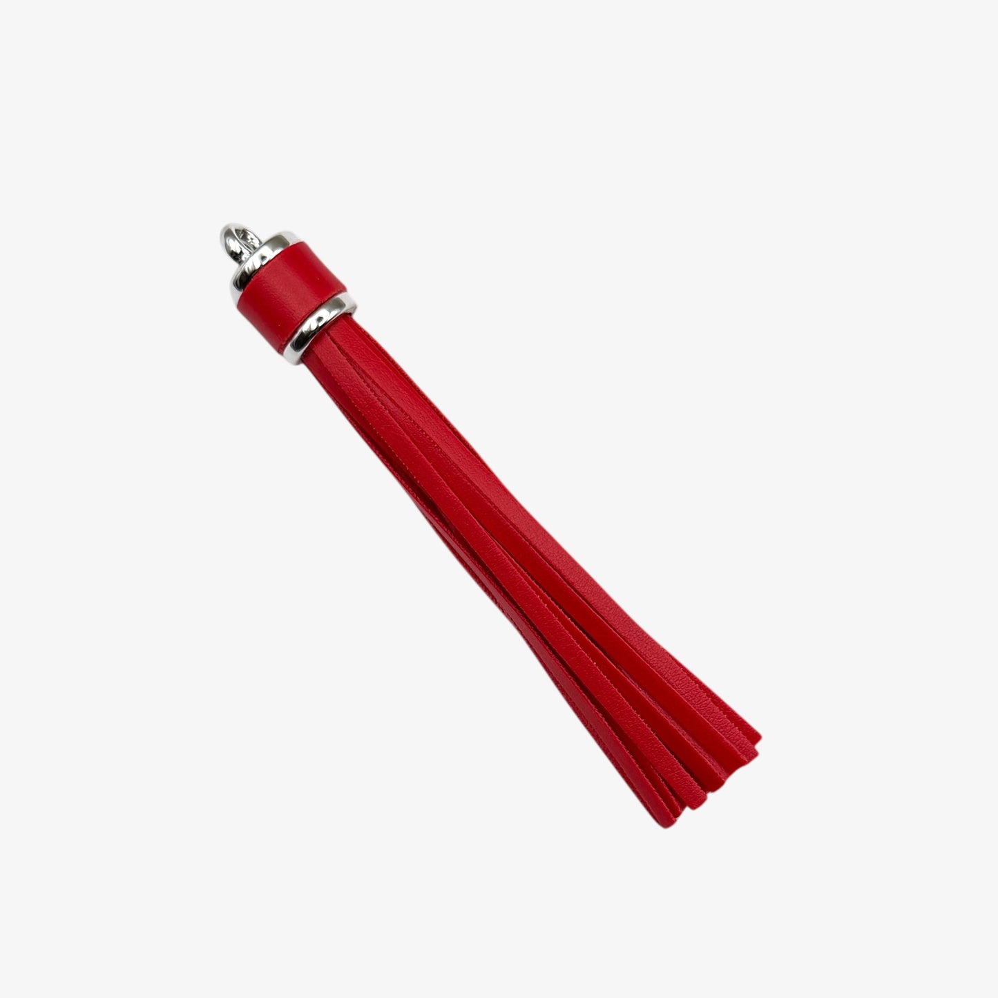 Metal dental tool on a white background