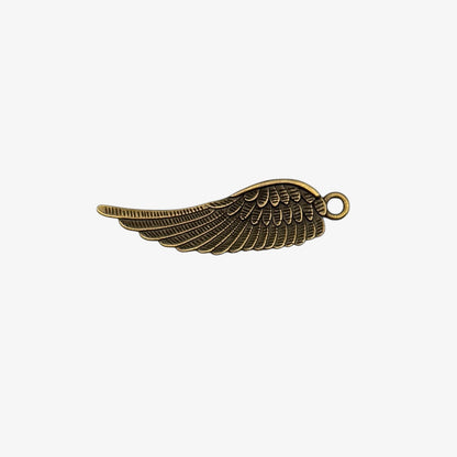 Metallic object with a green light on a white background