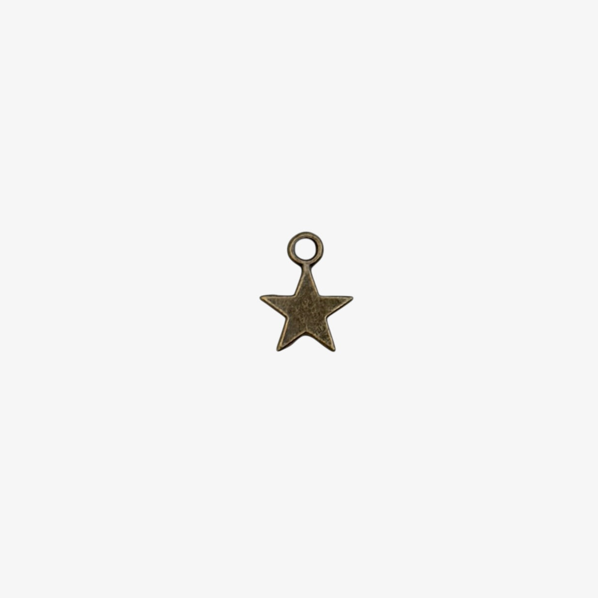 Bronze star-shaped pendant on a white background