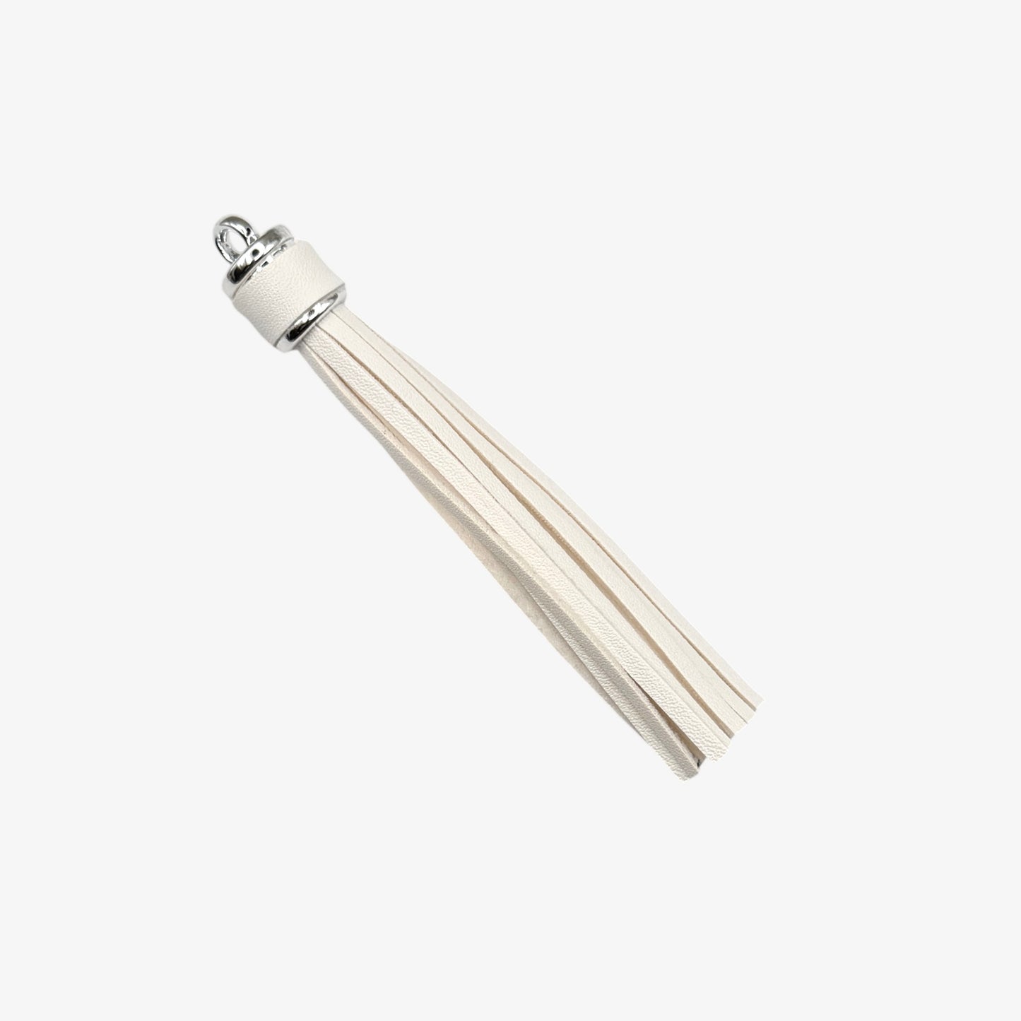 White tassel with silver top on a white background