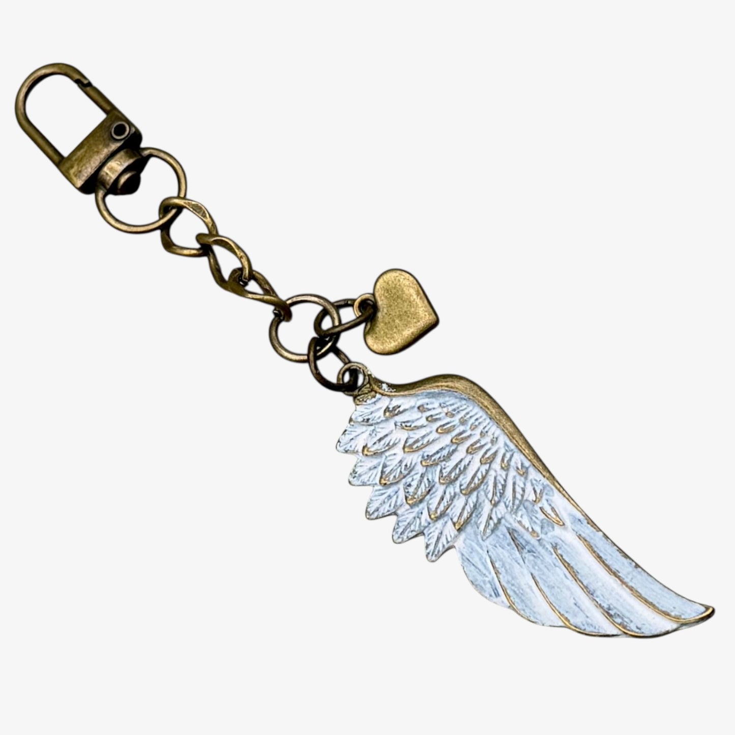 Keychain with angel wing design on a white background